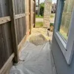 Gravel installation project for side yard drainage in Richmond TX