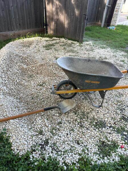 Weed barrier installation before gravel in Sugar Land TX